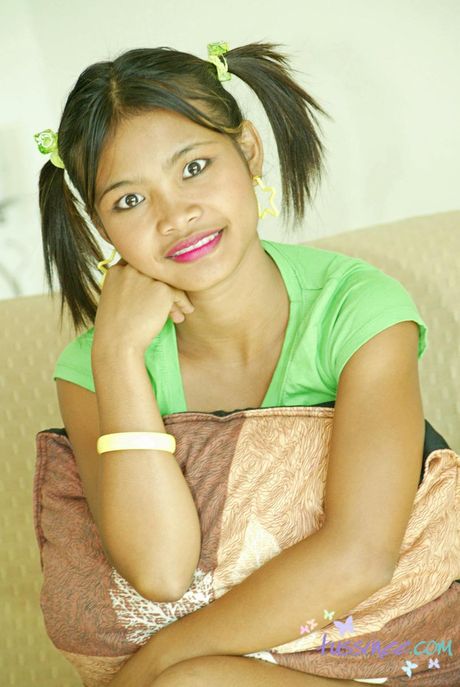 Asian Amateur Tussinee in pigtails gets naked