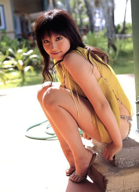 Stacked gravure idol hottie with big busty boobs in a bikini