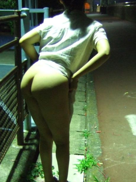 Asian amateur chick strips and shows her perfect butt and tits in a public place