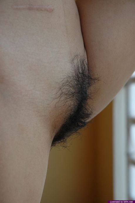 Skinny girl stripping and showing her beaver on a hotels balcony