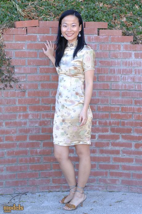 Asian mommy Niya Yu strips and shows her big booty and tits in a solo