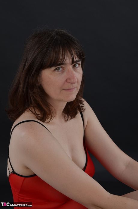 Asian babe with teen tits strips and shows her curves