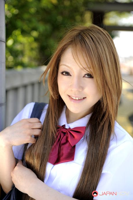 Wonderful Japanese schoolgirl Ria Sakurai shows off outdoors