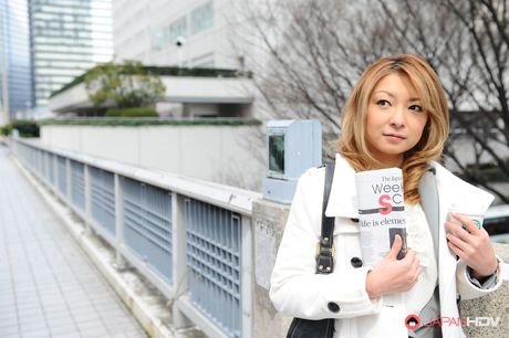 Beautiful office lady Nao posing outdoors with so much pleasure