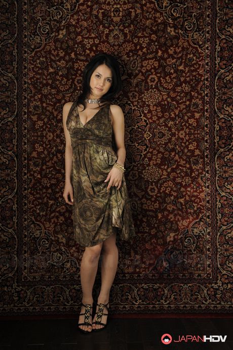 Dreamy Japanese model Maria Ozawa posing and looking horny for cock.