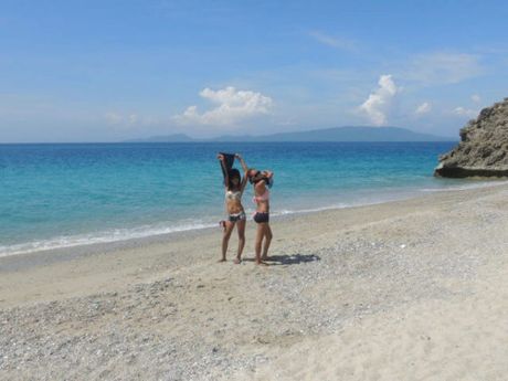 Asian teen Hazel strips off and unveils her tiny tits and hairy pussy